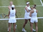 Barbora Krejcikova, top right, and Katerina Siniakova of the Czech Republic, celebrate after beating China's Shuai Zhang, bottom left, and Belgium's Elise Mertens. Barbora Krejcikova, top right, and Katerina Siniakova of the Czech Republic, celebrate after beating China's Shuai Zhang, bottom left, and Belgium's Elise Mertens.