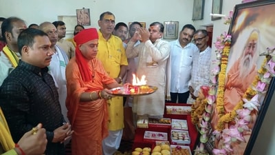 Brahmachari Dharanand offers prayers to Swaroop Nand Saraswati at Mankameshwar temple on the occasion of Guru Purnima, in Prayagraj. The Jagat guru also added that the disciples received blessings from their Gurus.&nbsp; (ANI)