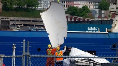 Debris from the Titan submersible, recovered from the ocean floor near the wreck of the Titanic, is unloaded from the ship Horizon Arctic at the Canadian Coast Guard pier in St. John's, Newfoundland, Wednesday, June 28, 2023. (Paul Daly/The Canadian Press via AP) (AP) Debris from the Titan submersible, recovered from the ocean floor near the wreck of the Titanic, is unloaded from the ship Horizon Arctic at the Canadian Coast Guard pier in St. John's, Newfoundland, Wednesday, June 28, 2023. (Paul Daly/The Canadian Press via AP) (AP)