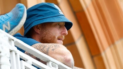 England's Ben Stokes watches Josh Tongue and James Anderson bat from the balcony (Action Images via Reuters)