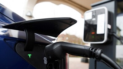 The charging plug of a Tesla electric car is pictured. (REUTERS)