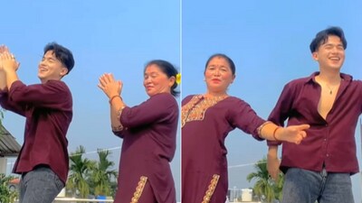 The image shows a mom dancing to Jab Chhaye Mera Jadoo with her son. (Instagram/@ucancallme_visu) The image shows a mom dancing to Jab Chhaye Mera Jadoo with her son. (Instagram/@ucancallme_visu)
