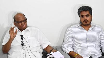 NCP president Sharad Pawar and his grandnephew Rohit Pawar at residence Modibaug in Pune. NCP chief Sharad Pawar has been promoting his grandnephew Rohit as the party’s young face after his nephew Ajit Pawar joined the Maharashtra government. (KALPESH NUKTE) NCP president Sharad Pawar and his grandnephew Rohit Pawar at residence Modibaug in Pune. NCP chief Sharad Pawar has been promoting his grandnephew Rohit as the party’s young face after his nephew Ajit Pawar joined the Maharashtra government. (KALPESH NUKTE)