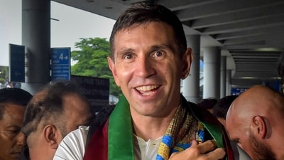 Argentina goalkeeper Emiliano Martinez arrives at Netaji Subhas Chandra Bose International Airport in Kolkata (PTI) Argentina goalkeeper Emiliano Martinez arrives at Netaji Subhas Chandra Bose International Airport in Kolkata (PTI)