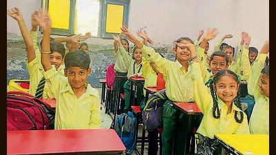 Students in a jubilant mood on returning to school after weeks of summer vacations in Ludhiana. (HT PHOTO)