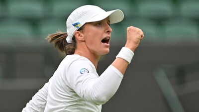 Poland's Iga Swiatek celebrates beating China's Zhu Lin during their women's singles tennis match on the first day of the 2023 Wimbledon Championships (AFP) Poland's Iga Swiatek celebrates beating China's Zhu Lin during their women's singles tennis match on the first day of the 2023 Wimbledon Championships (AFP)