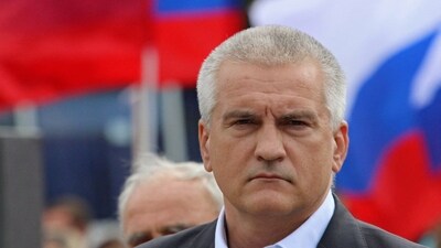 FILE PHOTO: Head of Crimea Sergei Aksyonov attends a ceremony as reservists drafted during partial mobilisation depart for military bases, in Sevastopol, Crimea September 27, 2022. REUTERS/Alexey Pavlishak/File Photo (REUTERS)