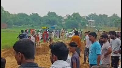 Villagers gather at the spot where the accident took place. (HT Photo)