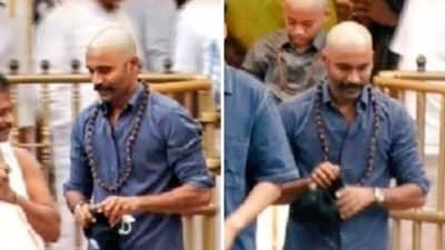 Dhanush shocked fans by shaving his hair off for a recent visit to Tirupati Temple.
