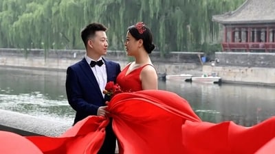 High youth unemployment and financial stress are keeping young people from choosing to marry and start families. ( JADE GAO/AFP/Getty Images) High youth unemployment and financial stress are keeping young people from choosing to marry and start families. ( JADE GAO/AFP/Getty Images)