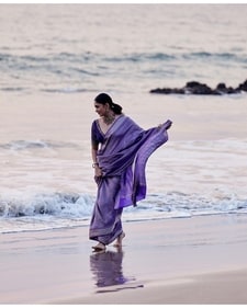 Mrunal Thakur walks barefoot on beach in first look from Nani30. Mrunal Thakur walks barefoot on beach in first look from Nani30.