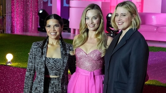 From left, America Ferrera, Margot Robbie and director Greta Gerwig pose for photos during the pink carpet event for the movie Barbie in Seoul, South Korea, The film is to be released in the country on July 19.&nbsp;(AP)
