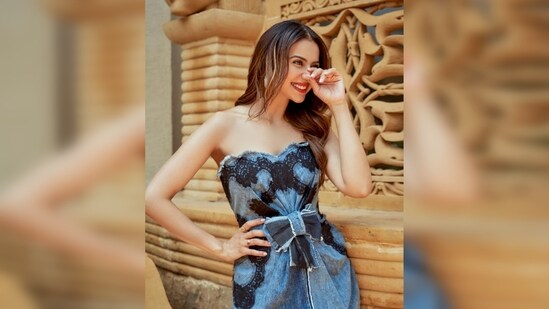 Rakul Preet gives fashionistas a run for their money in a short printed denim dress featuring a bow in the middle.&nbsp;(Instagram/@rakulpreet)