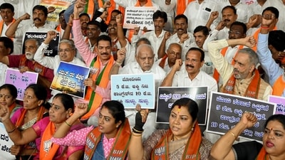 Former Karnataka Chief Minister BS Yediyurappa, BJP state President Nalin Kumar Kateel and others during a protest against the state government in Bengaluru on Tuesday. (ANI Photo) (Savitha B) Former Karnataka Chief Minister BS Yediyurappa, BJP state President Nalin Kumar Kateel and others during a protest against the state government in Bengaluru on Tuesday. (ANI Photo) (Savitha B)