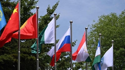 Flags flutter at the headquarters of the Shanghai Cooperation Organisation in Beijing on July 4, 2023. India will host the Shanghai Cooperation Organisation, with Iran expected to join the Asian grouping and Russian President Vladimir Putin addressing his first summit since a short-lived mutiny, officials said. (AFP) Flags flutter at the headquarters of the Shanghai Cooperation Organisation in Beijing on July 4, 2023. India will host the Shanghai Cooperation Organisation, with Iran expected to join the Asian grouping and Russian President Vladimir Putin addressing his first summit since a short-lived mutiny, officials said. (AFP)