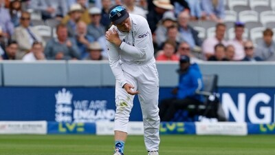 England's Ollie Pope reacts after injuring his shoulder while fielding. (AFP) England's Ollie Pope reacts after injuring his shoulder while fielding. (AFP)