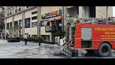 Fire tenders from Zirakpur and Dera Bassi fire stations controlled the situation. (HT Photo)