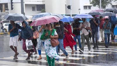 Kochi: Pedestrians during monsoon rain, in Kochi, Tuesday, June 27, 2023. (PTI Photo)(PTI06_27_2023_000119B) (PTI)