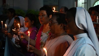 Members of Catholic Association of Bengal organized a candlelight Procession after Holy Mass Praying for Peace in Manipur at St. Thomas Church in Kolkata, India, on Sunday. (Photo by Samir Jana/ Hindustan Times) Members of Catholic Association of Bengal organized a candlelight Procession after Holy Mass Praying for Peace in Manipur at St. Thomas Church in Kolkata, India, on Sunday. (Photo by Samir Jana/ Hindustan Times)