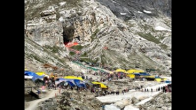 Pilgrims on their way to the Amarnath Cave temple during the Amarnath Yatra at Pahalgam tehsil of the Anantnag district on Monday. (ANI)