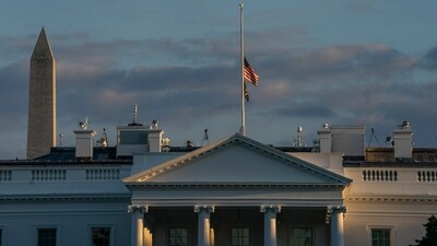 FILE - With the Washington Monument in the background, the American flag flies at half-staff over the White House, Sept. 8, 2022, in Washington, after Queen Elizabeth II, Britain's longest-reigning monarch and a rock of stability across much of a turbulent century, died at 96 after 70 years on the throne. Only in the mid-19th century does the U.S. flag become a permanent fixture at the White House, scholars believe. (AP Photo/Gemunu Amarasinghe, File) (AP) FILE - With the Washington Monument in the background, the American flag flies at half-staff over the White House, Sept. 8, 2022, in Washington, after Queen Elizabeth II, Britain's longest-reigning monarch and a rock of stability across much of a turbulent century, died at 96 after 70 years on the throne. Only in the mid-19th century does the U.S. flag become a permanent fixture at the White House, scholars believe. (AP Photo/Gemunu Amarasinghe, File) (AP)