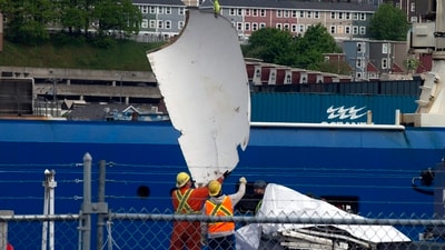Debris from the Titan submersible, recovered from the ocean floor near the wreck of the Titanic, is unloaded from the ship Horizon Arctic at the Canadian Coast Guard pier in St. John's, Newfoundland, Wednesday, June 28, 2023. AP/PTI(AP06_28_2023_000234B) (AP) Debris from the Titan submersible, recovered from the ocean floor near the wreck of the Titanic, is unloaded from the ship Horizon Arctic at the Canadian Coast Guard pier in St. John's, Newfoundland, Wednesday, June 28, 2023. AP/PTI(AP06_28_2023_000234B) (AP)