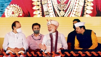 Ajit Pawar with Prime Minister Narendra Modi and Devendra Fadnavis at the event last year. (Pratham Gokhale/HT file photo) Ajit Pawar with Prime Minister Narendra Modi and Devendra Fadnavis at the event last year. (Pratham Gokhale/HT file photo)