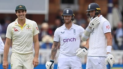 Stuart Broad and Pat Cummins had a brief exchange after Jonny Bairstow's dismissal. (Getty)