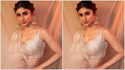 Mouni's ethnic diaries are replete with inspo. A few days back, Mouni shared a set of pictures of herself looking like a diva in an ivory white lehenga. (Instagram/@imouniroy) Mouni's ethnic diaries are replete with inspo. A few days back, Mouni shared a set of pictures of herself looking like a diva in an ivory white lehenga. (Instagram/@imouniroy)