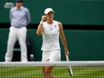 Iga Swiatek celebrates after defeating Sara Sorribes Tormo 