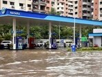 Surat: A waterlogged petrol pump following heavy rainfall, Surat: A waterlogged petrol pump following heavy rainfall,