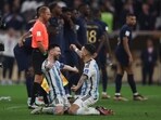 Lionel Messi and Leandro Paredes celebrate after Argentina defeat France in FIFA World Cup 2022 final.