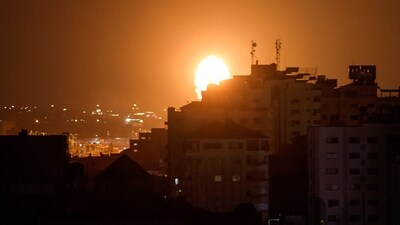 Smoke and flames rise above buildings after Israeli air airstrikes in Gaza City, on July 5. Israel withdrew its troops from a West Bank militant stronghold today but warned that its most intense military operation in the occupied territory in nearly two decades could be repeated, AP reported. (Mohammed Abed / AFP) Smoke and flames rise above buildings after Israeli air airstrikes in Gaza City, on July 5. Israel withdrew its troops from a West Bank militant stronghold today but warned that its most intense military operation in the occupied territory in nearly two decades could be repeated, AP reported. (Mohammed Abed / AFP)