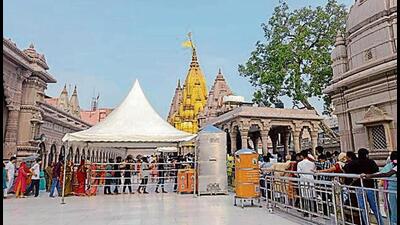 Devotees in queues at the Kashi Vishwanath temple in Varanasi on Wednesday marking the advent of the auspicious month of Shravan or Sawan. (ANI PHOTO) Devotees in queues at the Kashi Vishwanath temple in Varanasi on Wednesday marking the advent of the auspicious month of Shravan or Sawan. (ANI PHOTO)