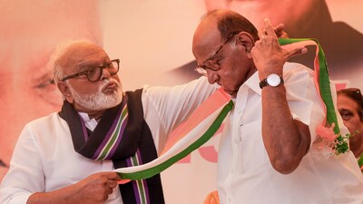 NCP chief Sharad Pawar and party's rebel leader Chhagan Bhujbal (PTI) NCP chief Sharad Pawar and party's rebel leader Chhagan Bhujbal (PTI)