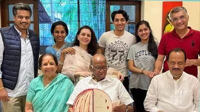 Sharad Pawar (seated centre) is flanked by his wife Pratibha and Ajit Pawar. Standing, from left: Pawar’s grandnephew and MLA from Karjat-Jamkhed Rohit Pawar; Sharad Pawar’s daughter Supriya Sule; her children Revati and Vijay with an unidentified cousin; and extreme right is Supriya’s husband Sadanand Sule. (BY ARRANGEMENT) Sharad Pawar (seated centre) is flanked by his wife Pratibha and Ajit Pawar. Standing, from left: Pawar’s grandnephew and MLA from Karjat-Jamkhed Rohit Pawar; Sharad Pawar’s daughter Supriya Sule; her children Revati and Vijay with an unidentified cousin; and extreme right is Supriya’s husband Sadanand Sule. (BY ARRANGEMENT)