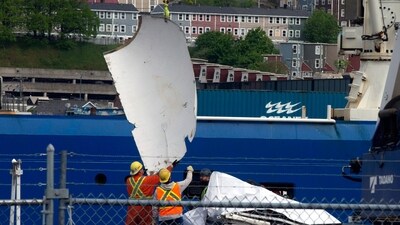 Debris from the Titan submersible, recovered from the ocean floor near the wreck of the Titanic, is unloaded from the ship Horizon Arctic at the Canadian Coast Guard pier in St. John's, Newfoundland (Paul Daly/The Canadian Press via AP) (AP) Debris from the Titan submersible, recovered from the ocean floor near the wreck of the Titanic, is unloaded from the ship Horizon Arctic at the Canadian Coast Guard pier in St. John's, Newfoundland (Paul Daly/The Canadian Press via AP) (AP)