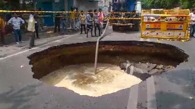 Visuals of the caved-in road in Janakpuri on Wednesday. (PTI Photo)