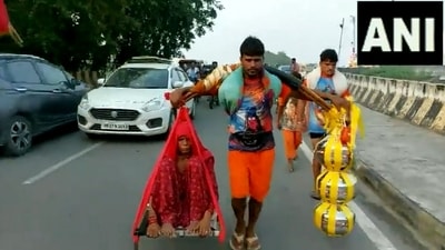 Kanwar Yatra: A devotee in Haridwar carrying his mother and water from the Ganga river. (Twitter/@ANINewsUP) Kanwar Yatra: A devotee in Haridwar carrying his mother and water from the Ganga river. (Twitter/@ANINewsUP)