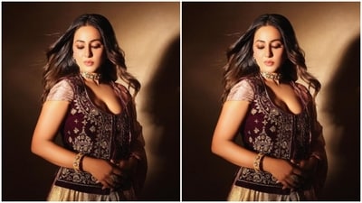 Hina decked up in the pastel golden silk gown and added a maroon overcoat featuring silver embroidery work. In a pastel pink dupatta, she added more ethnic vibes to her look. (Instagram/@realhinakhan) Hina decked up in the pastel golden silk gown and added a maroon overcoat featuring silver embroidery work. In a pastel pink dupatta, she added more ethnic vibes to her look. (Instagram/@realhinakhan)