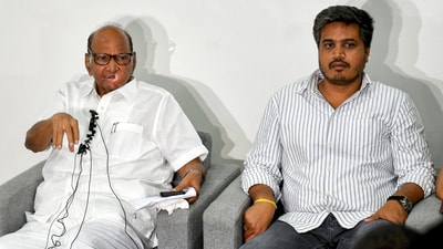 Nationalist Congress Party (NCP) President Sharad Pawar with party MLA Rohit Pawar speaks during a press conference. (PTI) Nationalist Congress Party (NCP) President Sharad Pawar with party MLA Rohit Pawar speaks during a press conference. (PTI)