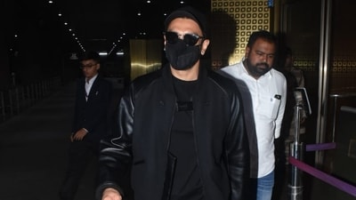 Ranveer Singh was hardly recognisable upon his arrival at the Mumbai airport Wednesday morning. He was in an all black-look and covered his face with a mask and sunglasses. The trailer of his upcoming film Rocky Aur Rani Kii Prem Kahaani released on Tuesday. Ranveer Singh was hardly recognisable upon his arrival at the Mumbai airport Wednesday morning. He was in an all black-look and covered his face with a mask and sunglasses. The trailer of his upcoming film Rocky Aur Rani Kii Prem Kahaani released on Tuesday. 