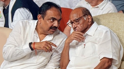 NCP chief Sharad Pawar with party leader Jayant Patil during the party meeting at Y B Chavan centre, in Mumbai, Wednesday, July 5, 2023. (PTI) NCP chief Sharad Pawar with party leader Jayant Patil during the party meeting at Y B Chavan centre, in Mumbai, Wednesday, July 5, 2023. (PTI)