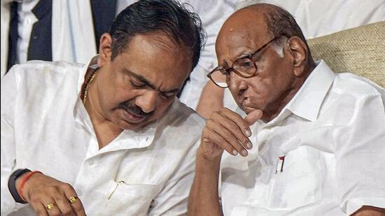 NCP chief Sharad Pawar with party leader Jayant Patil during the party meeting at Y B Chavan centre, in Mumbai, Wednesday, July 5, 2023. (PTI)