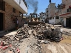 A bulldozer clears the rubble along a street in the occupied West Bank Jenin refugee camp on July 6, 2023, following a large-scale Israeli military operation that lasted for two days. A bulldozer clears the rubble along a street in the occupied West Bank Jenin refugee camp on July 6, 2023, following a large-scale Israeli military operation that lasted for two days.