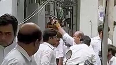 A lawyer fires a gun at Tis Hazari court in New Delhi on Wednesday. (ANI) A lawyer fires a gun at Tis Hazari court in New Delhi on Wednesday. (ANI)