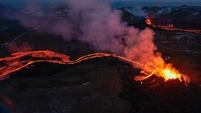 Iceland Earthquakes: Lava flows from two fissures from a volcano near along the Fagradalsfjall on the Reykjanes Peninsula in Iceland. (AFP)