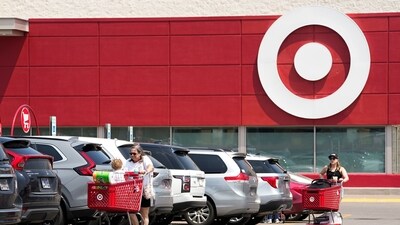 FILE - Customers make their way through the parking lot of a Target store Wednesday, May 24, 2023, in Nashville, Tenn. Target, Macy's and Dollar General are warning investors their sales will suffer during the remainder of 2023 as consumers shift spending to essentials. (AP Photo/George Walker IV, File) (AP) FILE - Customers make their way through the parking lot of a Target store Wednesday, May 24, 2023, in Nashville, Tenn. Target, Macy's and Dollar General are warning investors their sales will suffer during the remainder of 2023 as consumers shift spending to essentials. (AP Photo/George Walker IV, File) (AP)