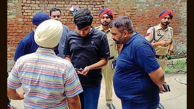 Police personnel at the spot in Adarsh Nagar on Thursday in Ludhiana. (HT PHOTO) Police personnel at the spot in Adarsh Nagar on Thursday in Ludhiana. (HT PHOTO)