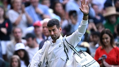 Serbia's Novak Djokovic walks off the court after winning his Wimbledon second round match against Australia's Jordan Thompson. (REUTERS)
